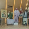 Image of Pope Francis and various saints