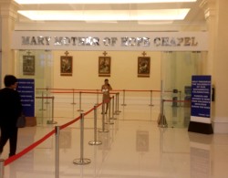 The entrance to Mary Mother of Hope Chapel. The chapel occupies an entire floor and this is what you will see after you step out the escalator. There are barriers to guide the attendees.
